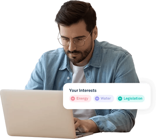 man using laptop with interests saying water, legislation and energy