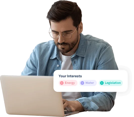 man using laptop with interests saying water, legislation and energy
